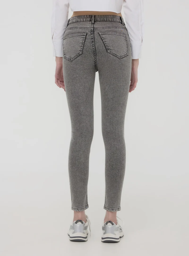 Jeggings a vita alta acid wash