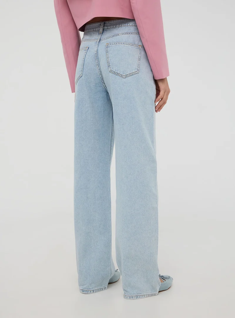 Jeans wide leg con strass