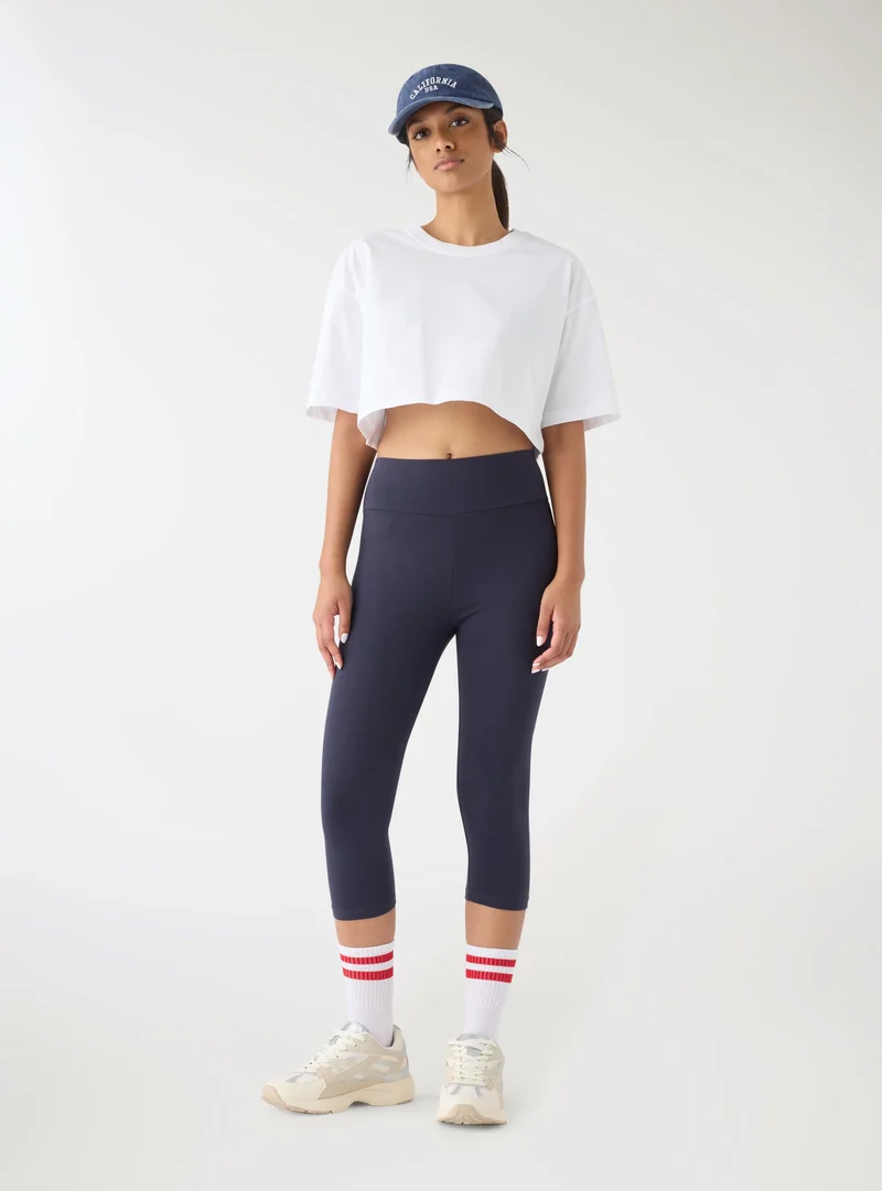 Leggings capri a tinta unita