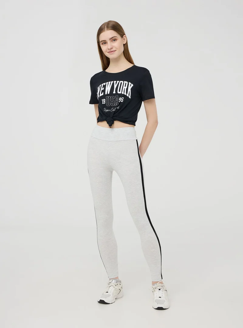 Leggings lunghi a vita alta con banda laterale