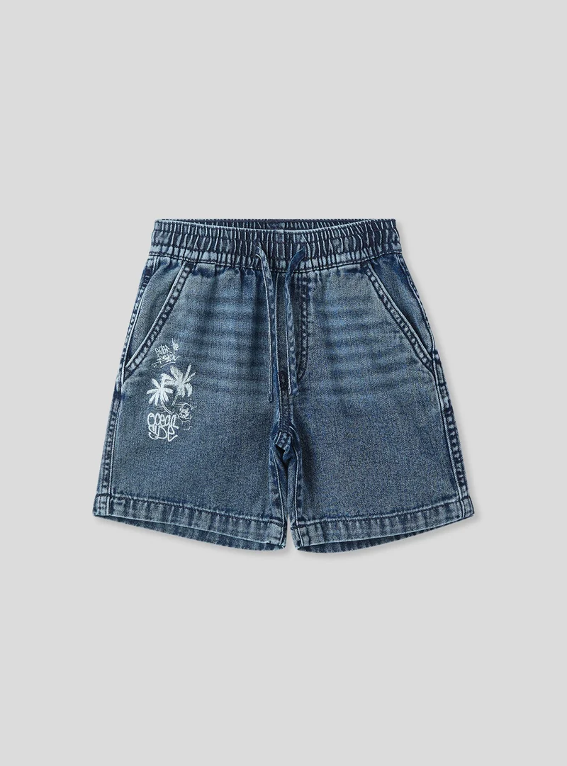 Shorts jogger in demim con stampa