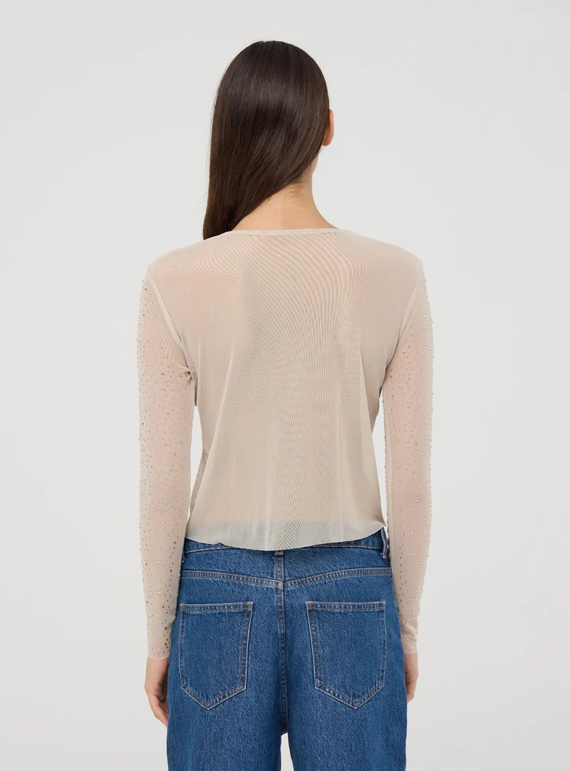 Maglia in tulle con strass