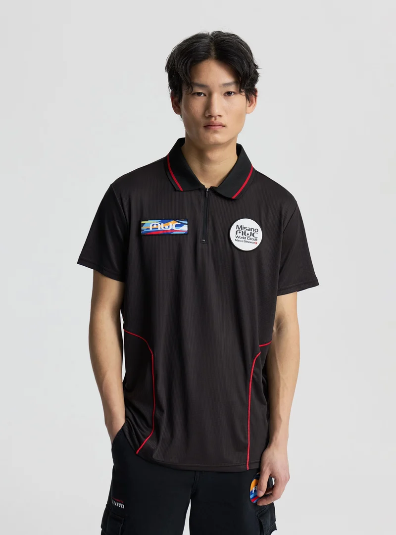 Polo con patch con logo MWC