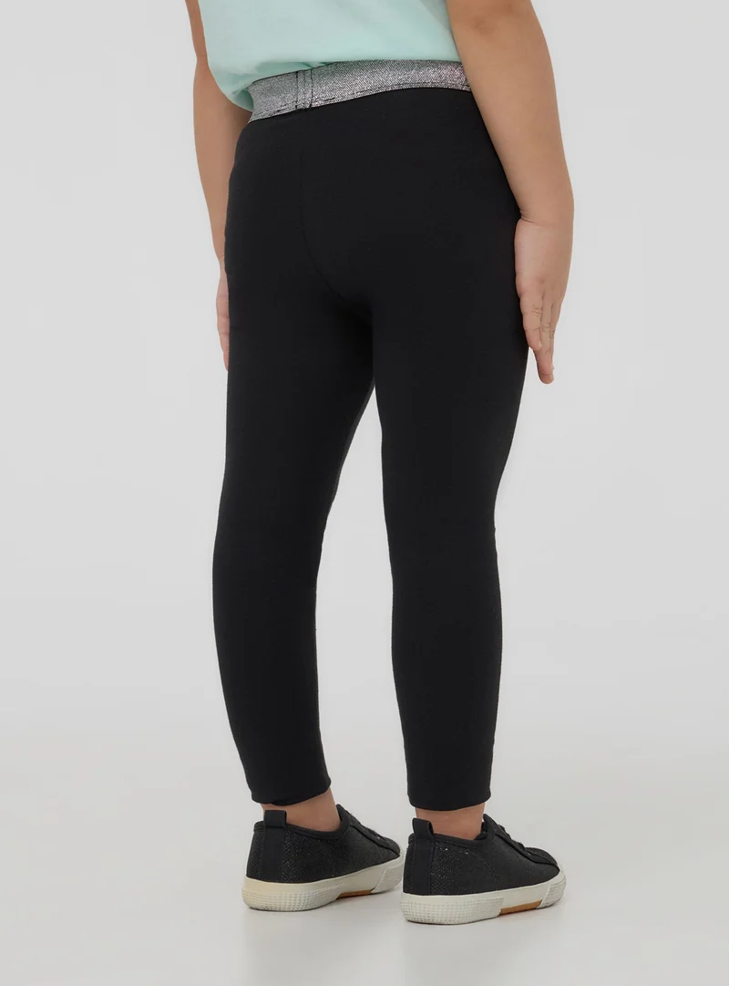 Leggings lunghi stampa unicorno e glitter