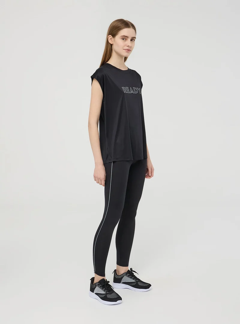 Leggings sportivi modellanti con bande