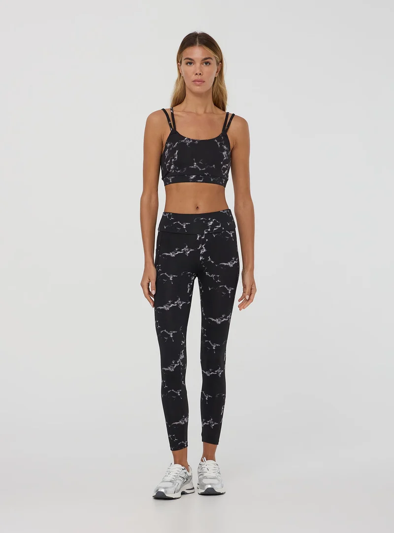 Leggings con tasca stampa effetto marmorizzato