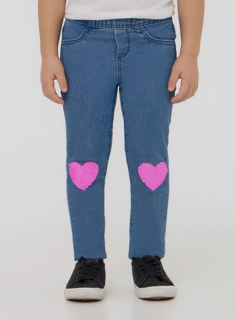 Jeggings con paillettes a cuore