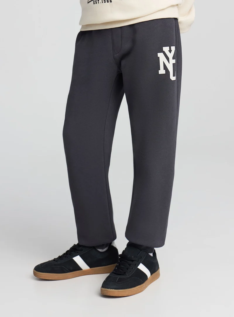 Pantaloni tuta con coulisse e stampa