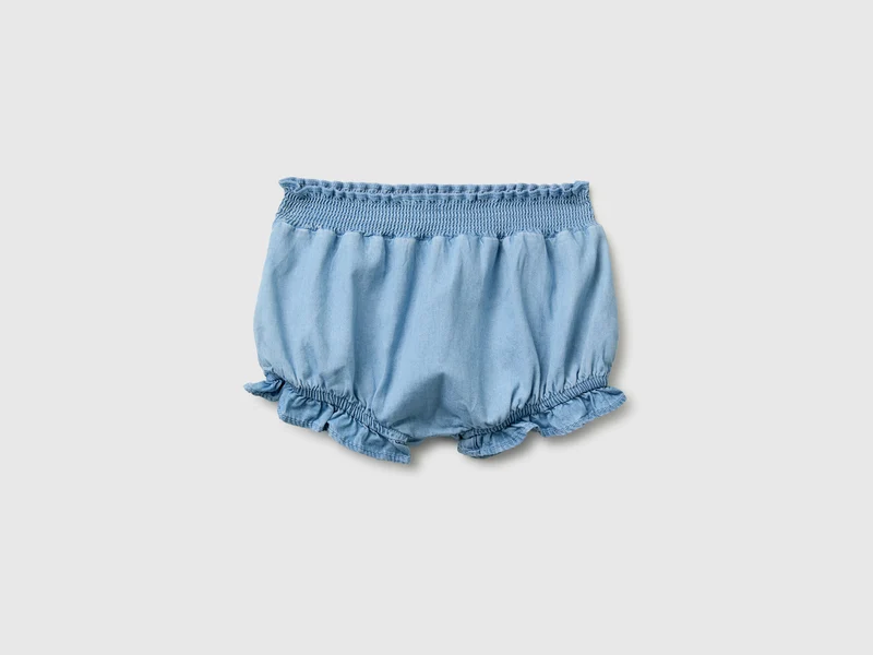 Shorts con mini rouches