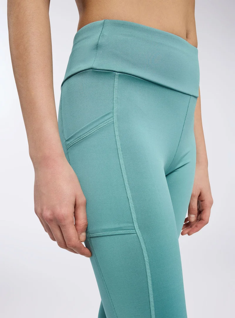 Leggings lunghi sportivi con tasca