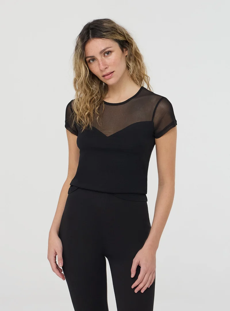 T-shirt con inserti in tulle