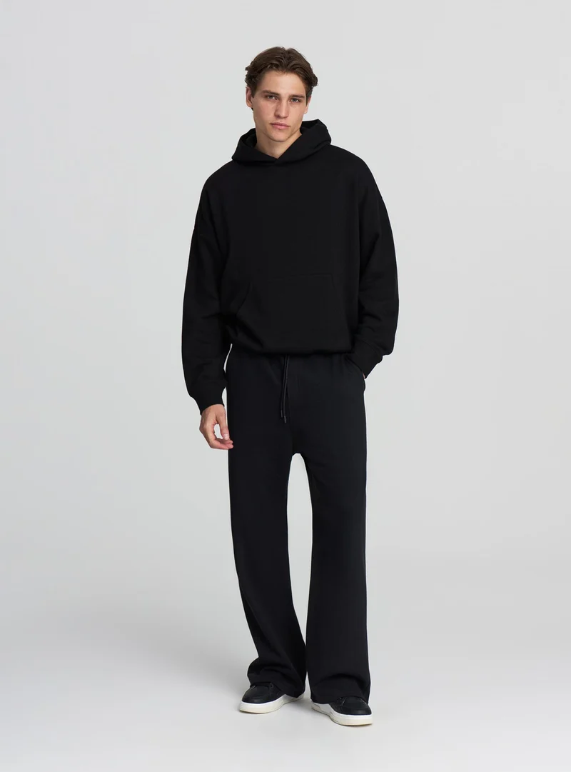 Pantaloni tuta wide leg con coulisse