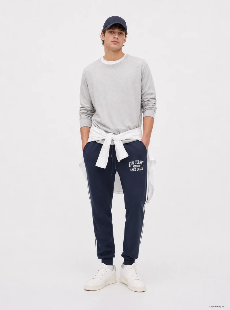 Pantaloni tuta con bande laterali