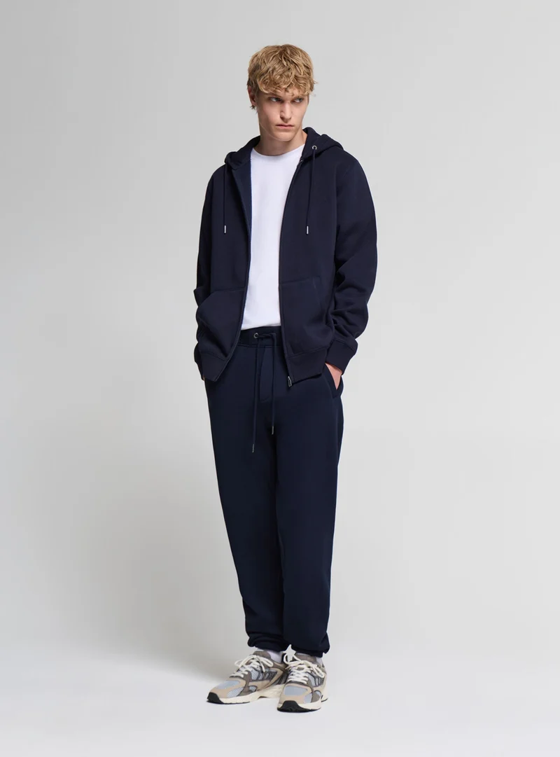 Pantaloni tuta con coulisse tinta unita
