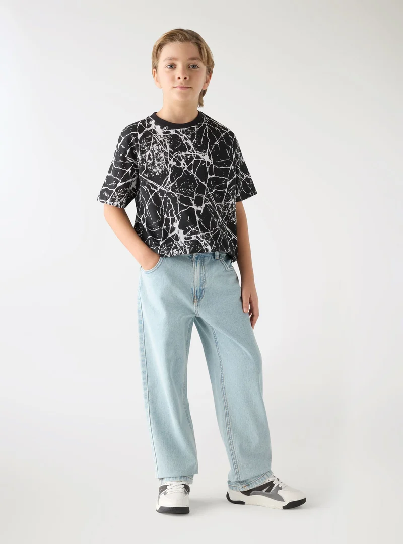 T-shirt con stampa marmo all-over