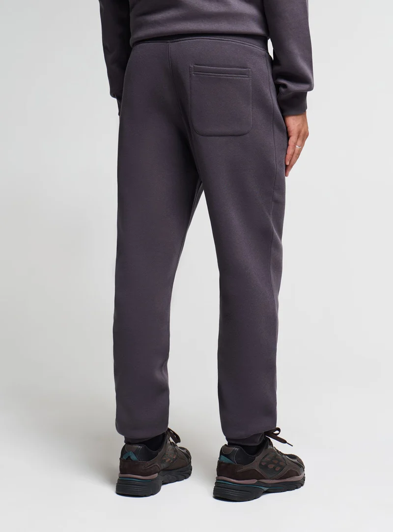 Pantaloni tuta con coulisse tinta unita
