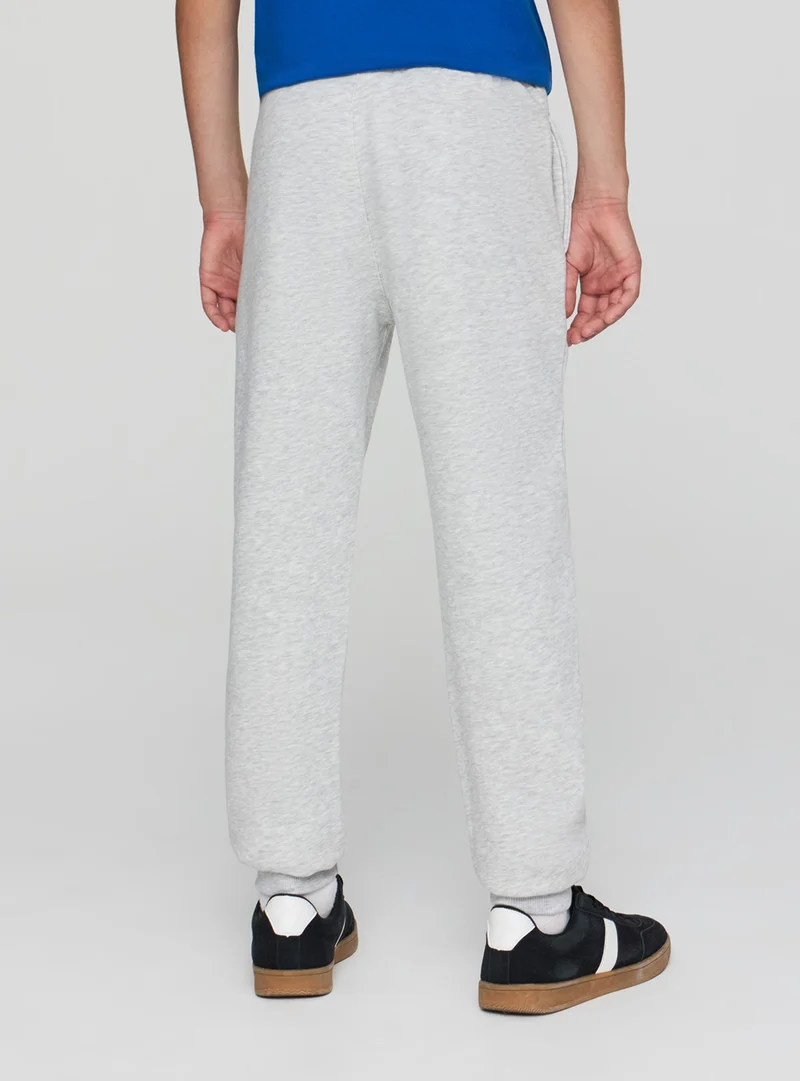 Pantaloni tuta con coulisse e stampa