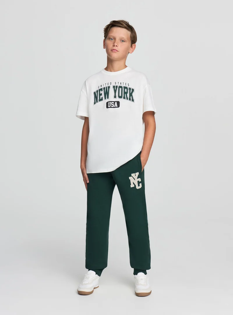 Pantaloni tuta con coulisse e stampa
