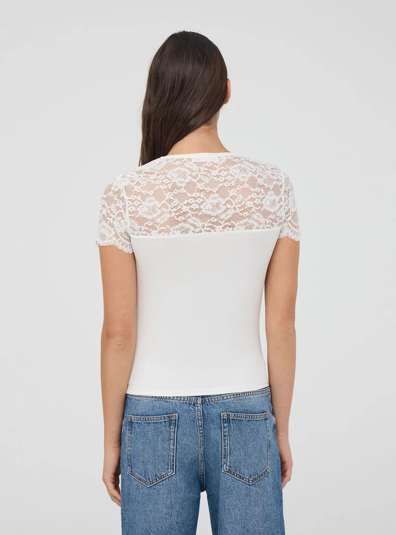 T-shirt con dettagli in pizzo