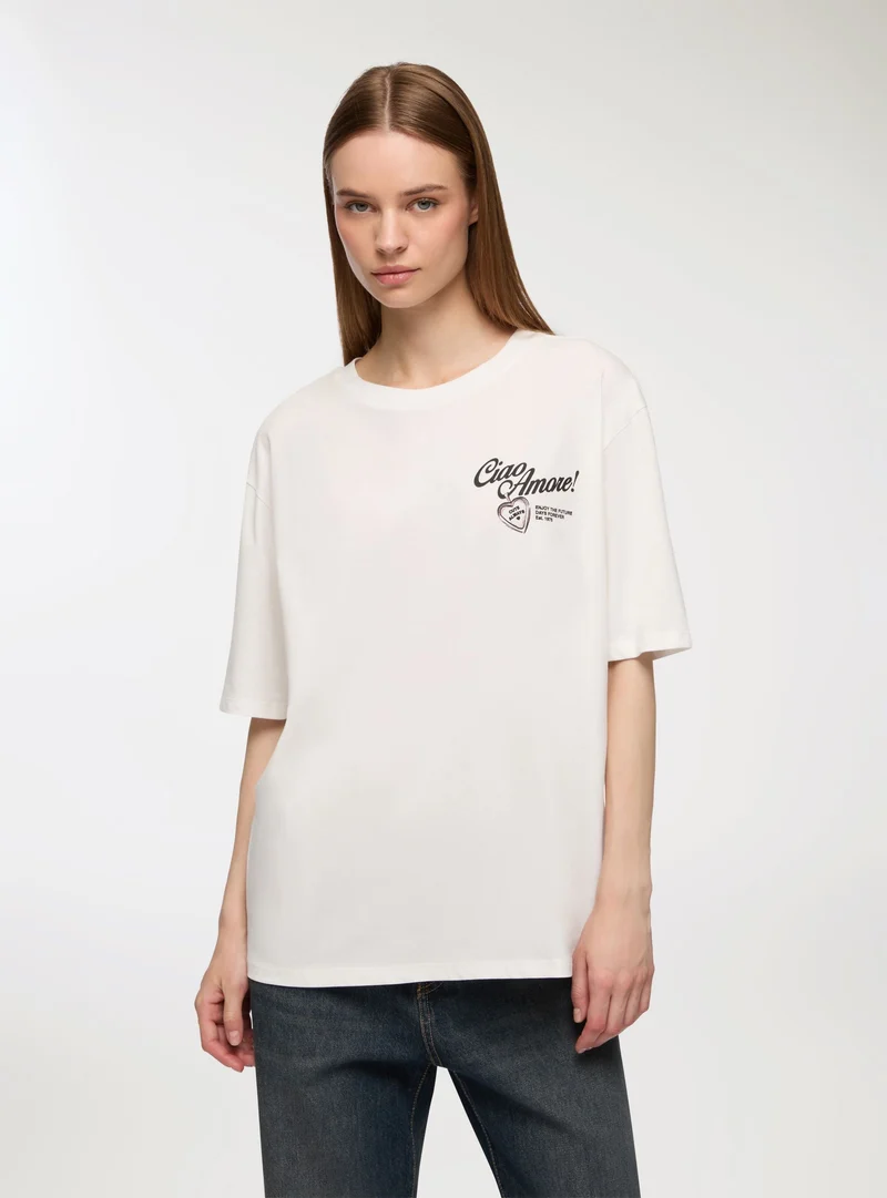 T-shirt ampia con stampa fronte/retro