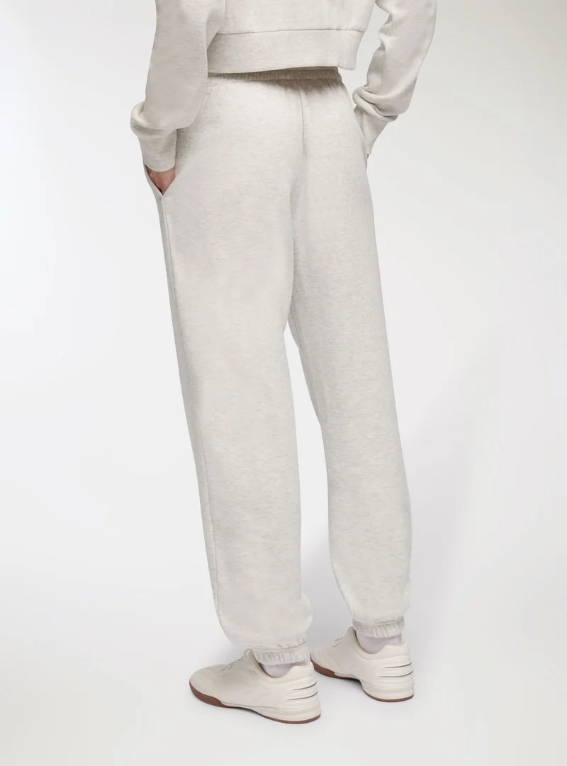 Pantaloni tuta vita alta con polsini