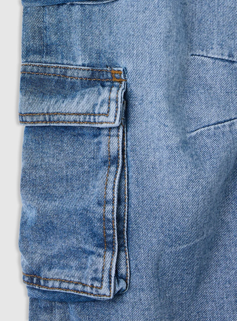 Jeans cargo wide leg con tasche
