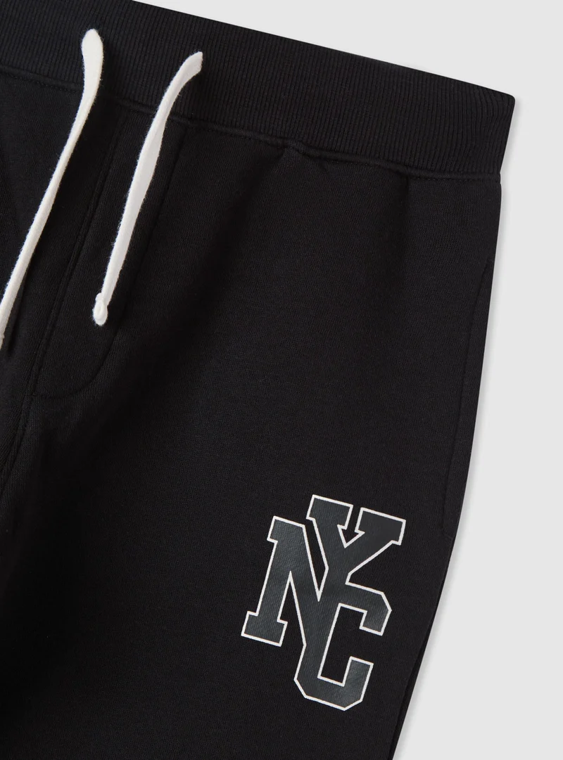 Pantaloni tuta con coulisse e stampa