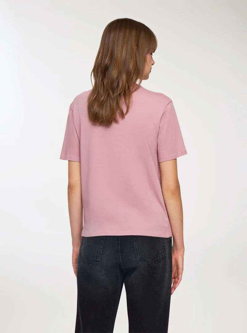 T-shirt ampia scritta luccicante
