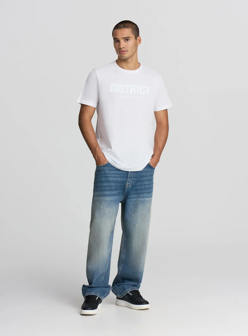 T-shirt con stampa scritta