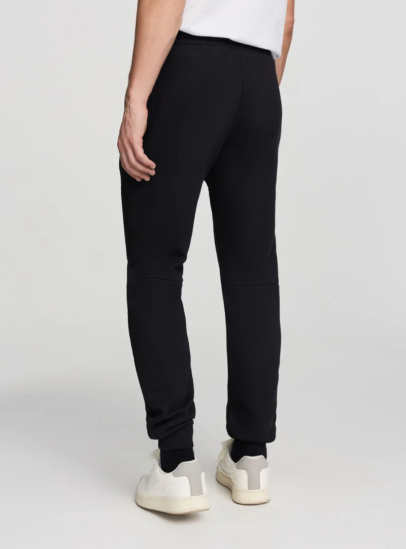 Pantaloni ginnici tessuto tecnico
