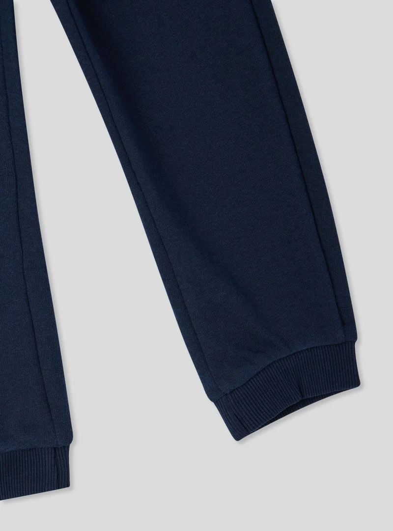 Pantaloni tuta leggeri tinta unita