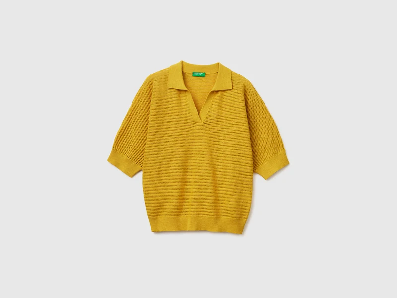 Polo traforata in misto lino