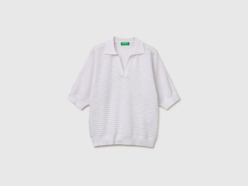 Polo traforata in misto lino