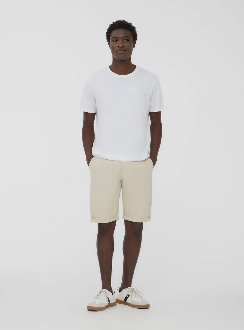 Bermuda chino tinta unita