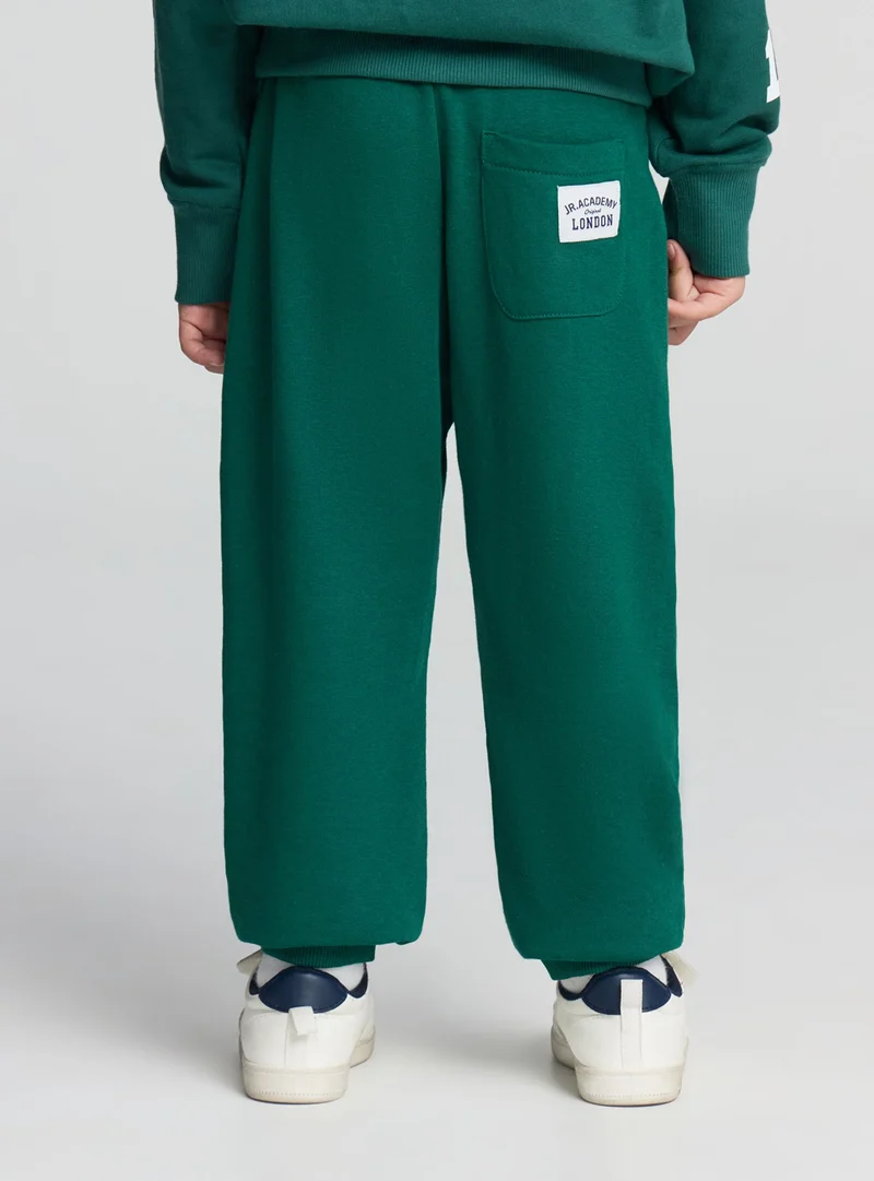 Pantaloni tuta leggeri tinta unita