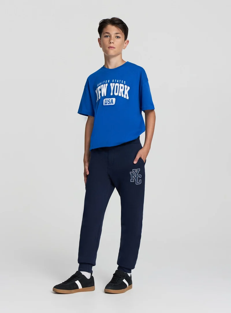 Pantaloni tuta con coulisse e stampa