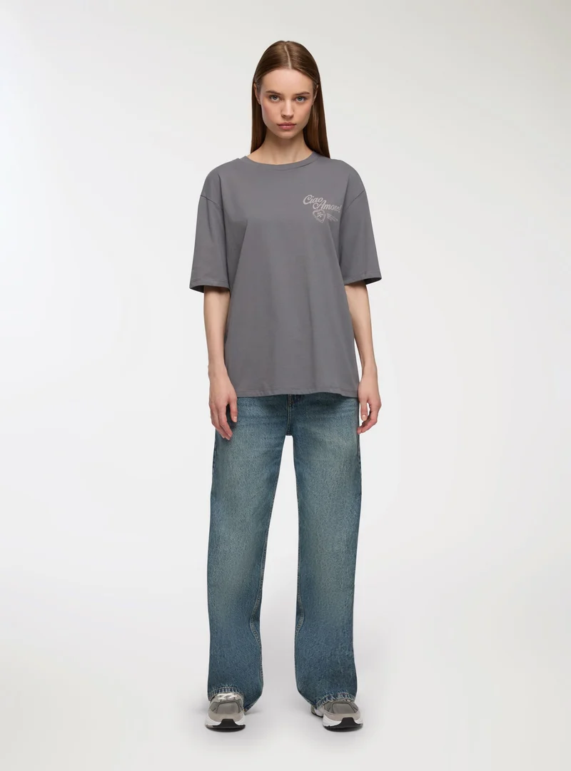 T-shirt ampia con stampa fronte/retro