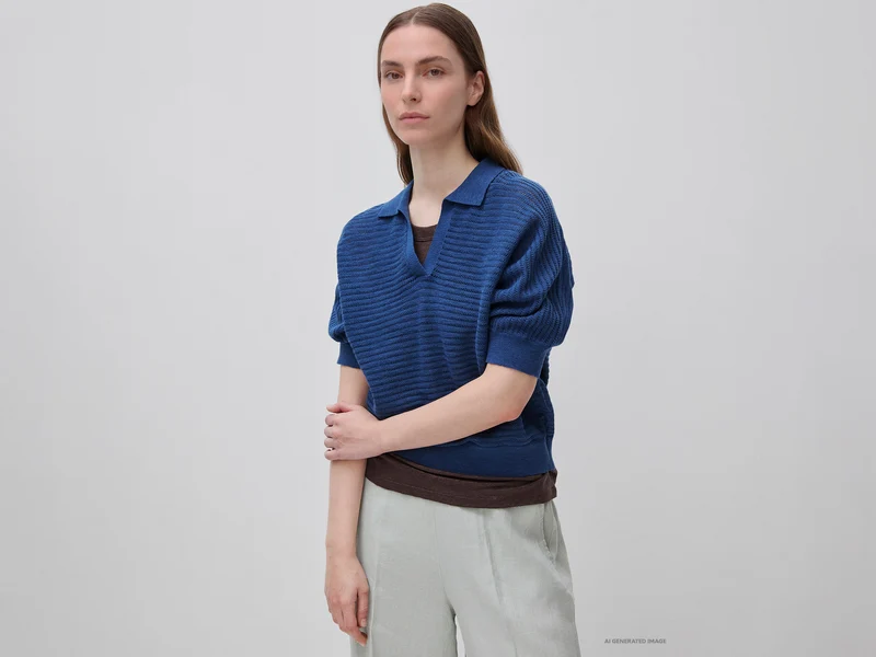 Polo traforata in misto lino