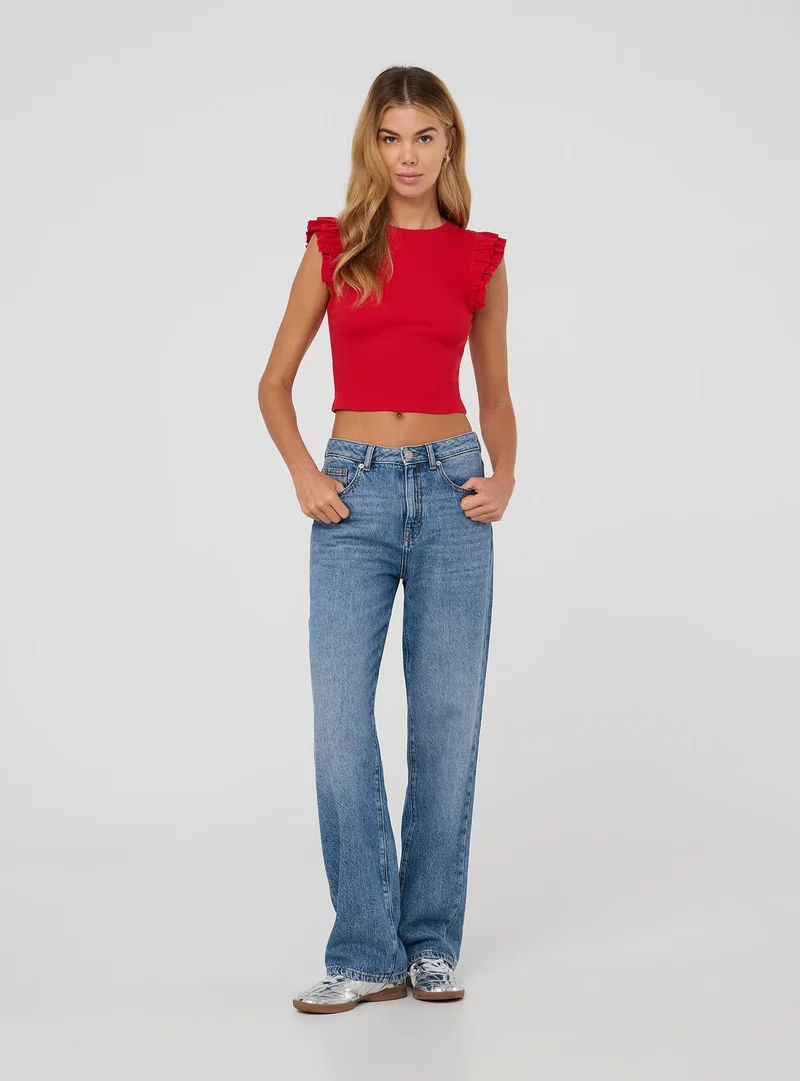 T-shirt crop con maniche a balze