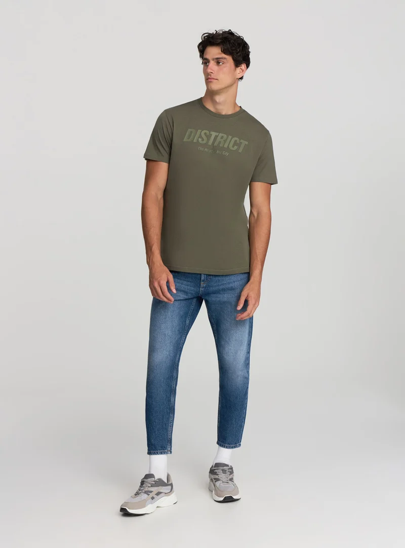 T-shirt con stampa scritta