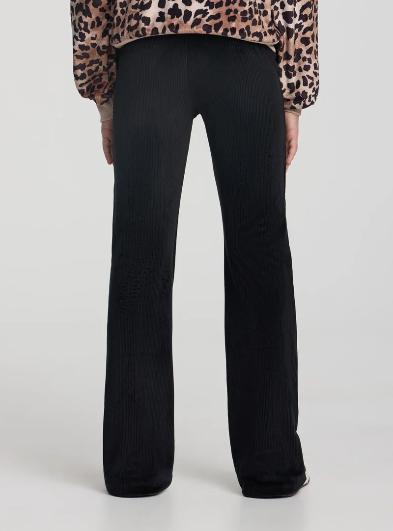 Leggings a zampa a costina