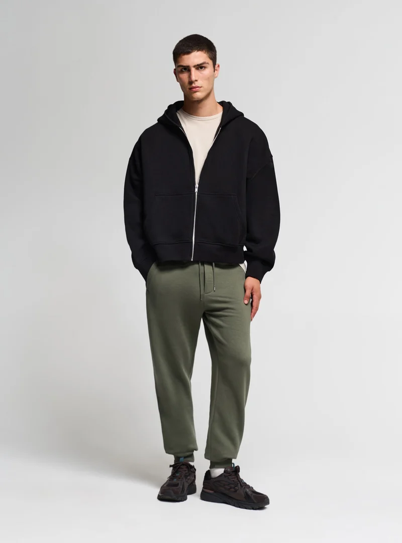 Pantaloni tuta con coulisse tinta unita