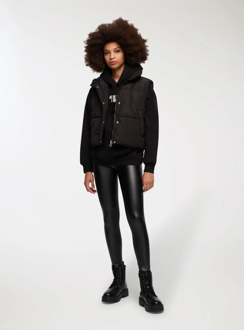 Leggings lucidi in similpelle
