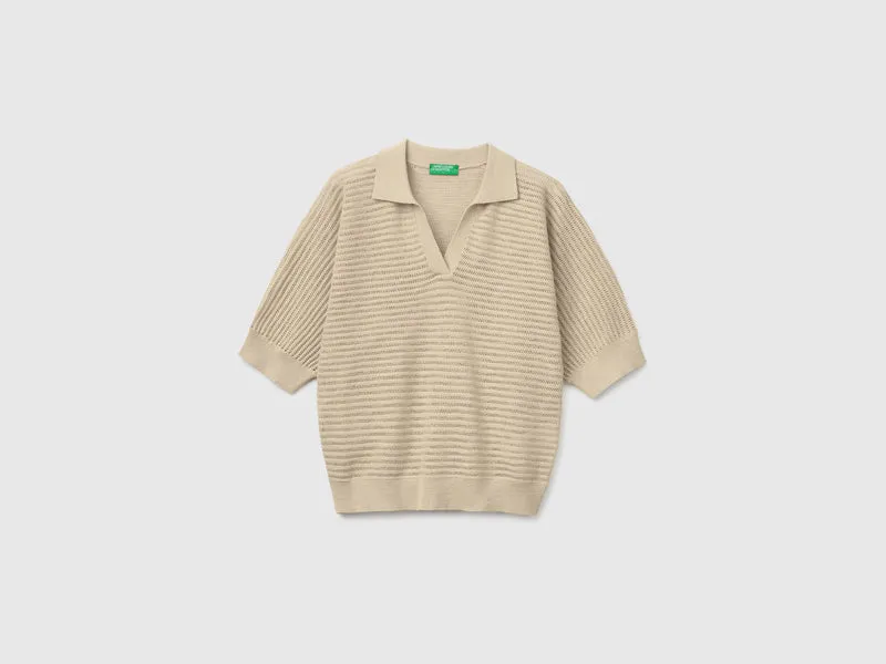 Polo traforata in misto lino