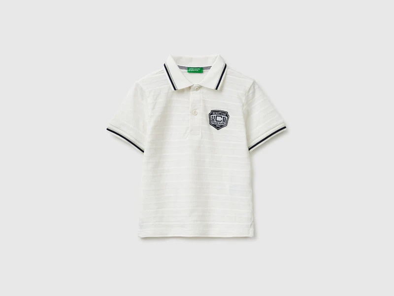 Polo rigata con patch