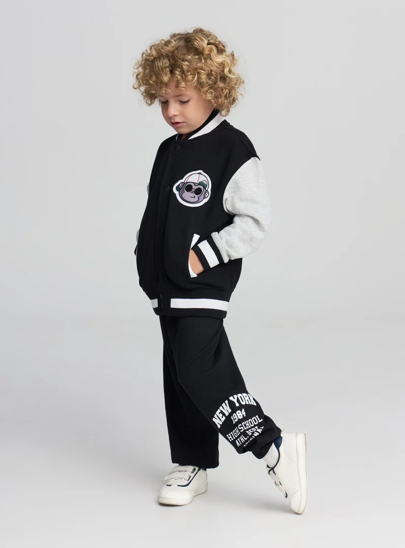 Pantaloni tuta con scritta