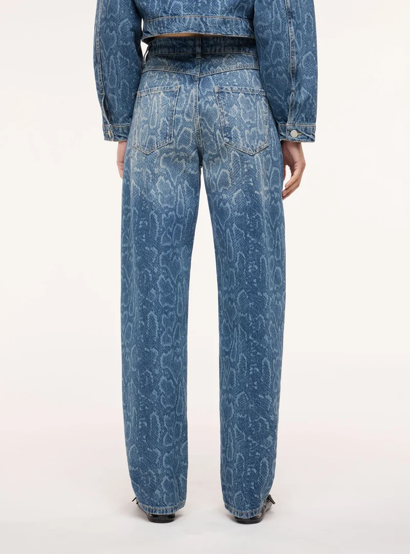 Giubbotto corto in denim con stampa pitone