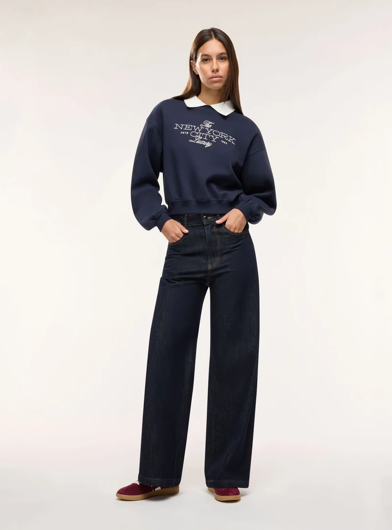 Jeans wide leg a tinta unita