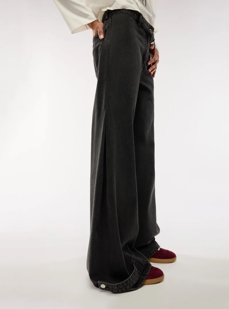Jeans wide leg a tinta unita