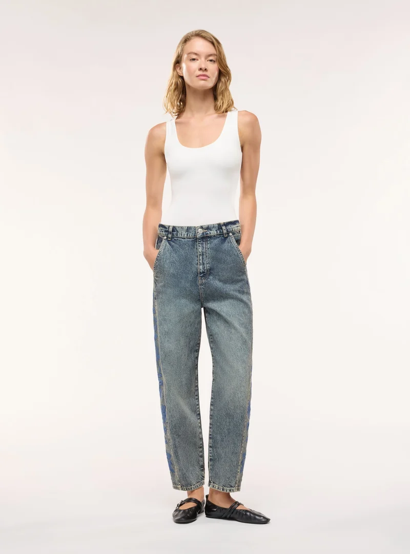 Jeans balloon con ricami laterali